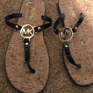 Michael Kor’s size 11 flip flop sandals
